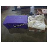 Purple storage box with blankets