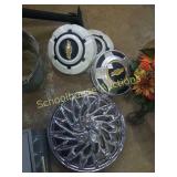 4 Chevy hubcaps and lone hubcap