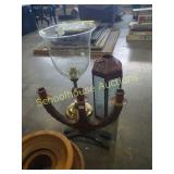 Red lantern, glass/brass candle holder, and wood