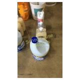 Gallon of bleach, two 3/4 full spa soap milk and