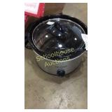 Two crock pots one big one little . A blender,