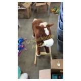 Rocking horse, well loved, his hindquarters are