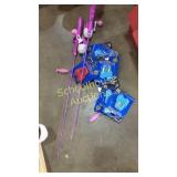 Two Shakespeare tots pink fishing poles, with