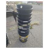 Stack of 9 black buckets