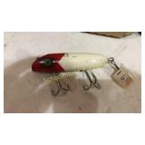 White red lure marked South Bend Bass-Oreno