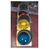 Old real stoplight. blue light, metal & glass