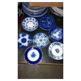 Assorted bread plates/saucers mostly flow blue.