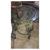 Small circle metal and glass end table