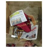 Box of news papers & eisle with a piece or 2 of