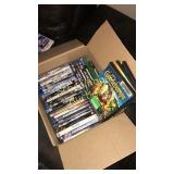 Small box of DVDs/blue rays and games. Some still