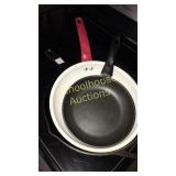 Lodge 10" well kept cast iron skillet, two other