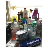 Pile of 1/2used and not used cleaning supplies.
