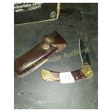 Schrader knife with sheath
