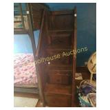 Wood stairs with drawers.