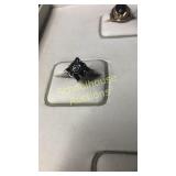 Black stone silver ring marked 10k