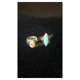 2 silver rings both marked 925. Brown stone also