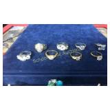 8 assorted rings. Front left marked 925, rest is
