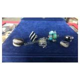 6 assorted large rings. 2 marked 935, 2 marked