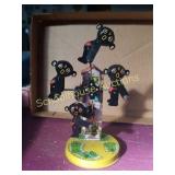 Windmill Tin toy. About 8 in tall