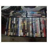 Flat of dvds. Over 20 dvds