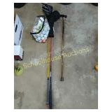 Golf balls & 2 clubs & a cane