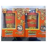 2 ceramic travel mugs with lids and a little