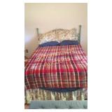 Queen sized bed. Includes green metal headboard,