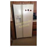 Working White GE side by side door fridge and