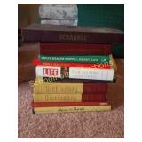 Stack of books and scrabble games