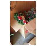 Two large boxes of Christmas, wreaths and flowers