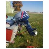 Nissan 40 hp boat motor with gas tank and