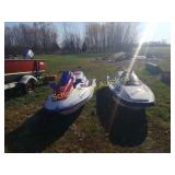 PIr of jet ski. Missing motors. Needs some love