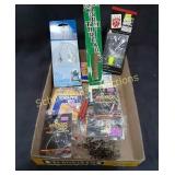 Flat of Fishing hooks, worm threader, small scale