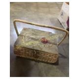 Vintage sewing basket with assorted thread