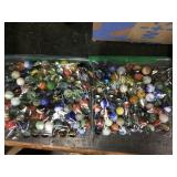 2 bags marbles  1 black shooter