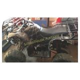 Black and silver small quad in a little rougher