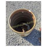 Beer keg with chains and binders