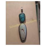 Sterling and turquoise pendant. Signed  W M T