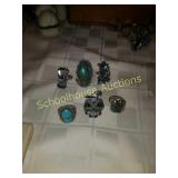 Group of 6 silver and turquoise rings. Most