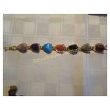 Bracelet with polished stones. Marked made in