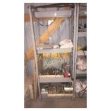 Metal display rack with misc welding rods and