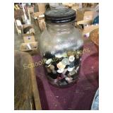 Old glass peanut jar of buttons