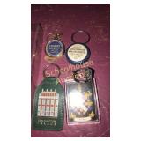 Key chains, lapel pin, and foreign coins