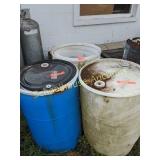 3 plastic barrels