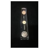 1964 proof set in lucite paperweight