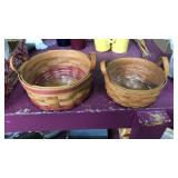 2 Longaberger baskets both with leather handles
