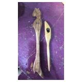 2 wood carved hand tools