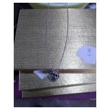 Essential oil tree of life pendant necklace.