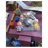 Toy lot.  Soldier dolls, teapot, bat, girl dolls,