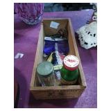 Small wooden box with goodies.